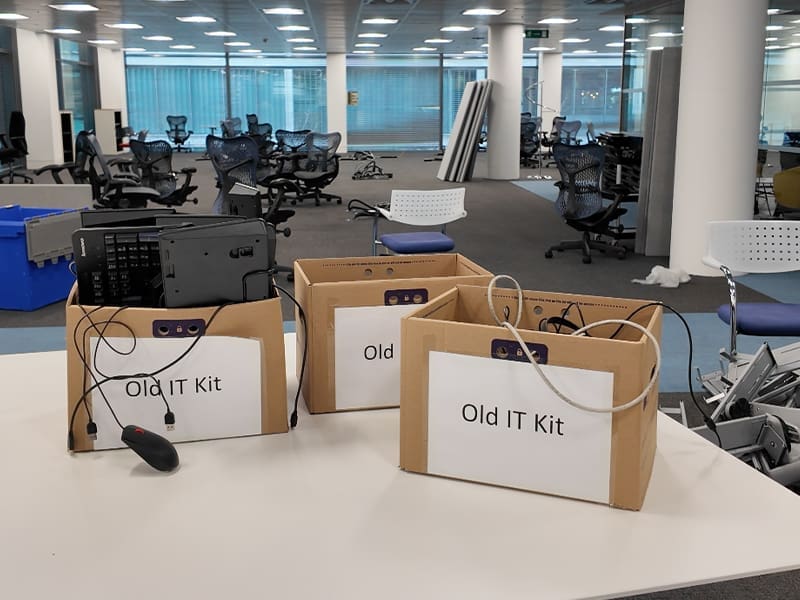table with a box on top of it in an office