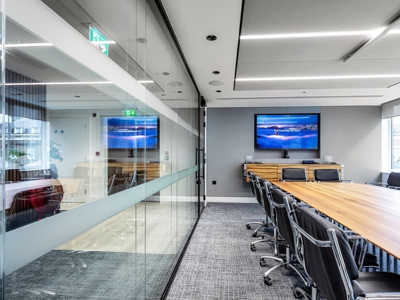 conference room with a wooden table and chairs